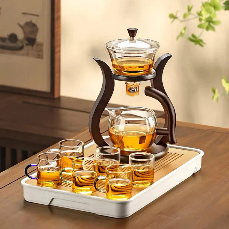 Heat Resistant Glass Tea Set featuring a Magnetic Water Rotating Cover